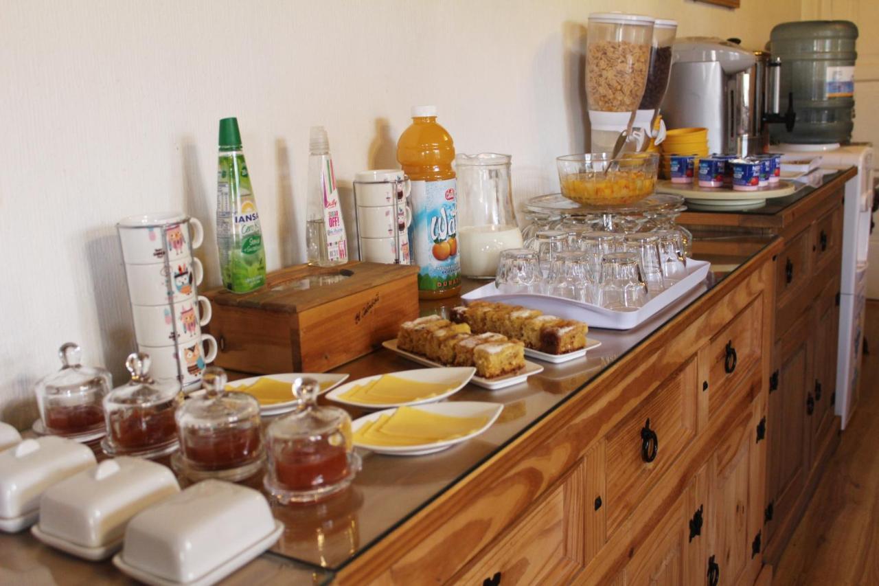 Hostal Y Cabanas Ainil Punta Arenas Buitenkant foto