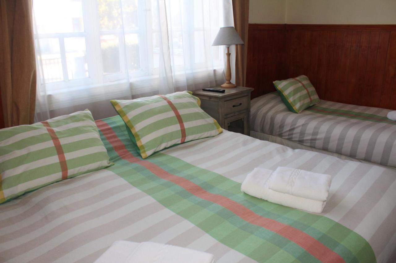 Hostal Y Cabanas Ainil Punta Arenas Buitenkant foto