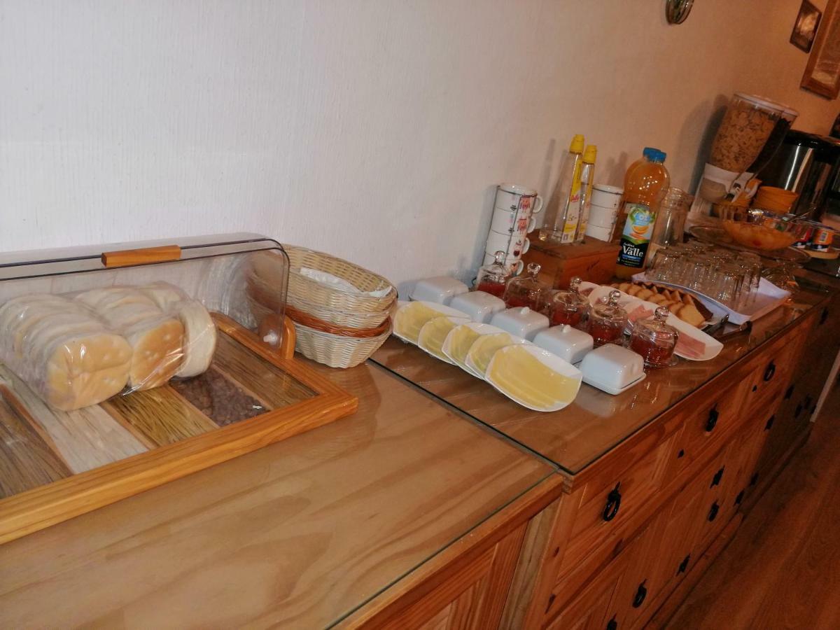 Hostal Y Cabanas Ainil Punta Arenas Buitenkant foto